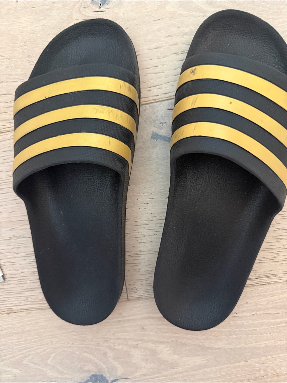 adidas Black Slides with Gold Stripes
